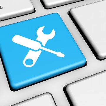 Reimage Repair system optimizer software price cost repair blue tools keyboard on computer keyboard wrench and screwdriver